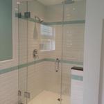 Frameless shower door without header